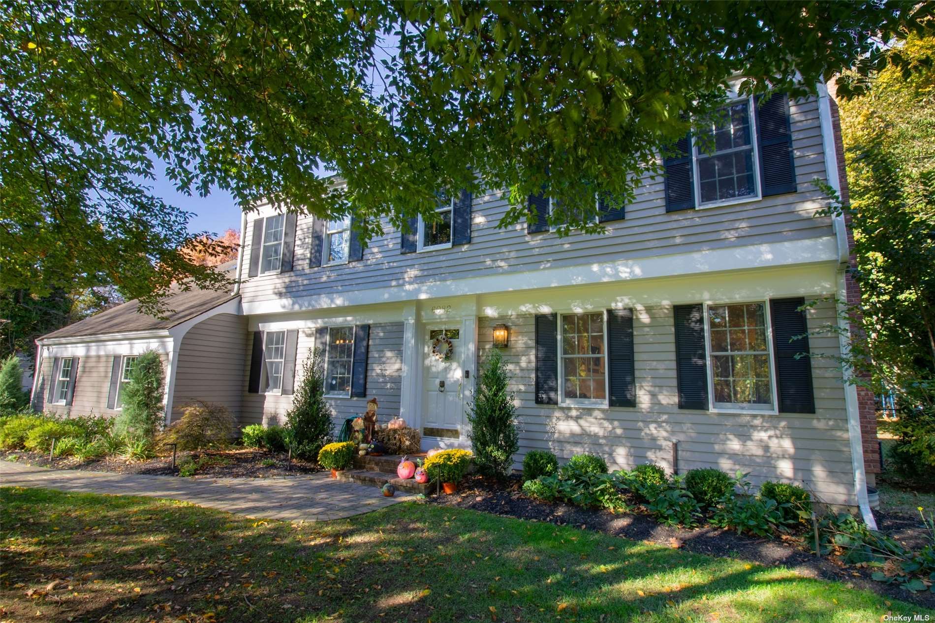 6082 North Country Road Wading River, NY 11792 - Photo 1 of 1 front view of a house with a yard