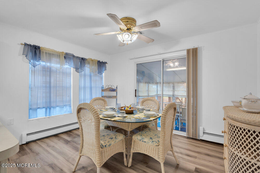 148 Davenport Road Toms River, NJ 08757 - Photo 21 of 49 a view of a dining room with furniture and wooden floor