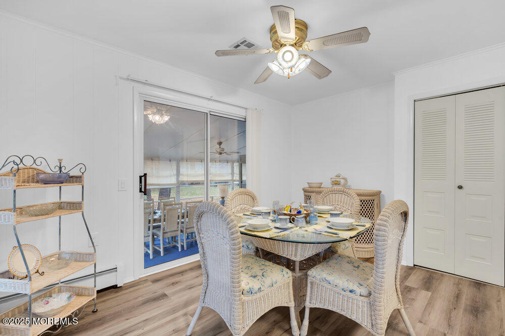 148 Davenport Road Toms River, NJ 08757 - Photo 22 of 49 a view of a dining room with furniture and wooden floor