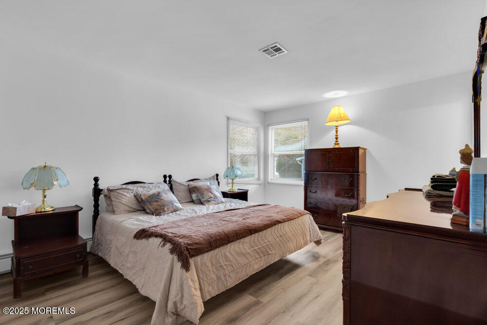 148 Davenport Road Toms River, NJ 08757 - Photo 27 of 49 a bedroom with a bed and a dresser