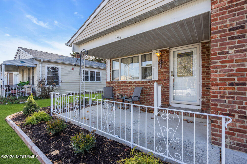 148 Davenport Road Toms River, NJ 08757 - Photo 3 of 49 a view of a house with wooden fence
