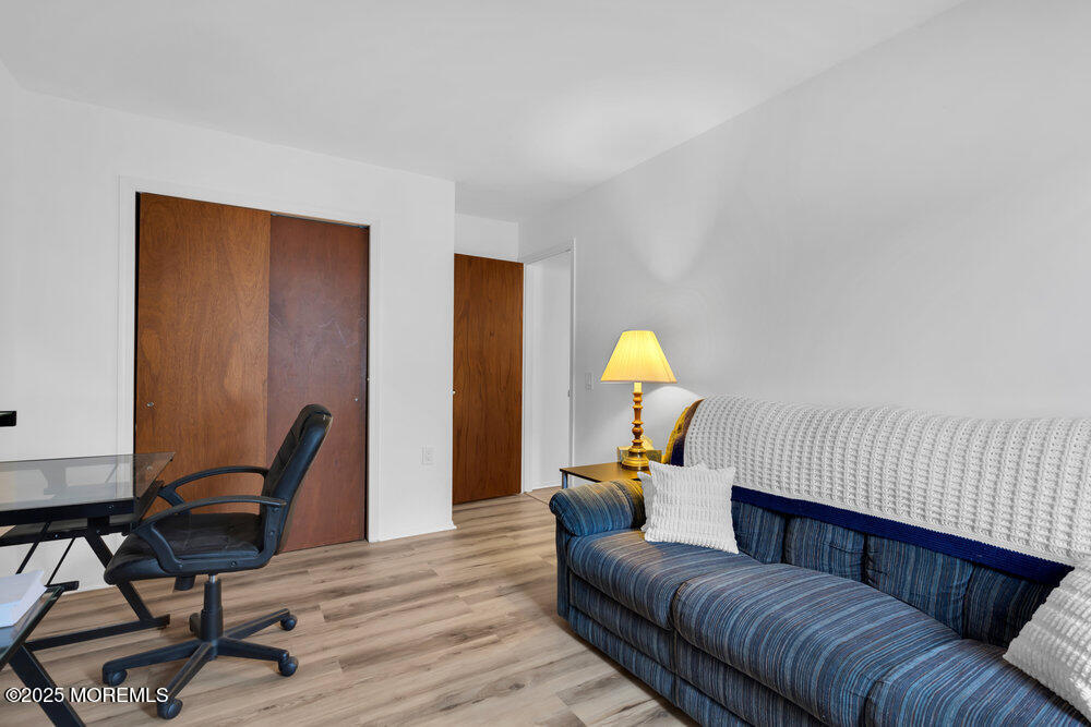 148 Davenport Road Toms River, NJ 08757 - Photo 31 of 49 a living room with furniture and a piano