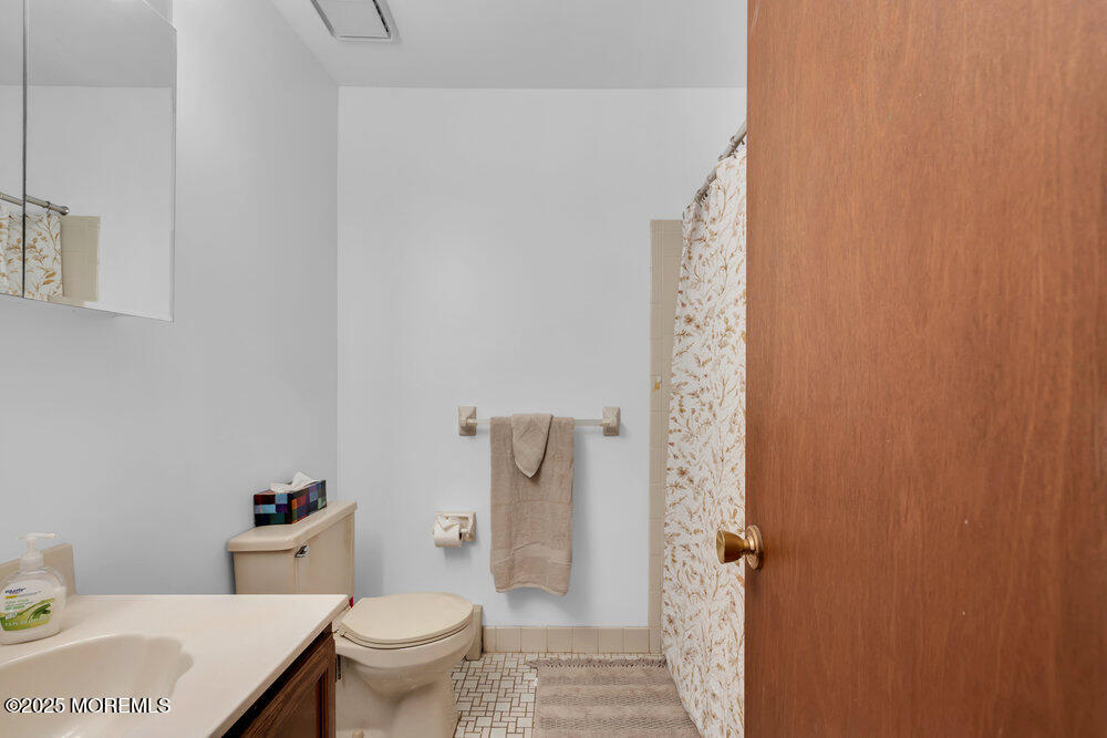 148 Davenport Road Toms River, NJ 08757 - Photo 32 of 49 a bathroom with a toilet and a shower