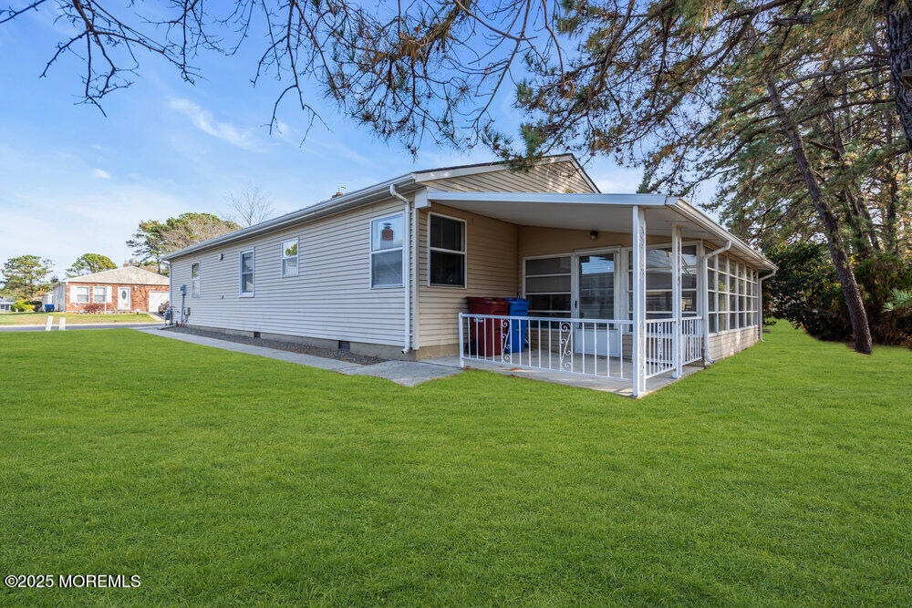 148 Davenport Road Toms River, NJ 08757 - Photo 36 of 49 a view of a house with a backyard