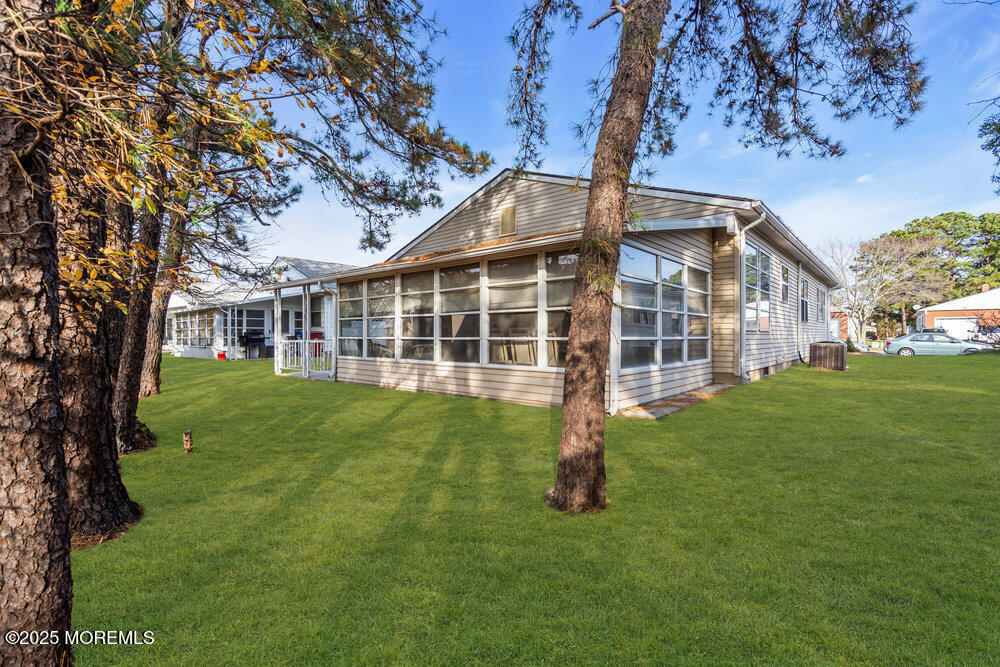 148 Davenport Road Toms River, NJ 08757 - Photo 40 of 49 a view of house with a garden