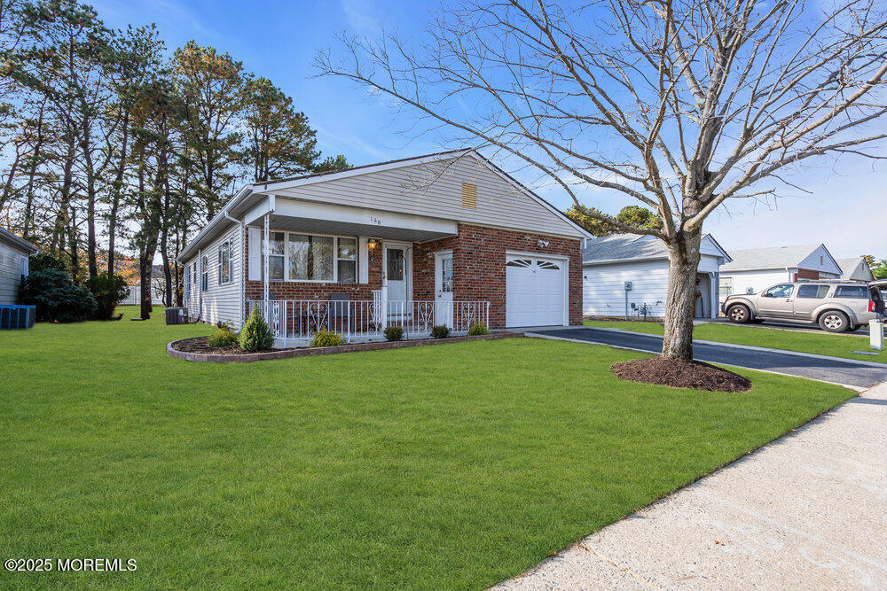 148 Davenport Road Toms River, NJ 08757 - Photo 45 of 49 a view of a house with a yard