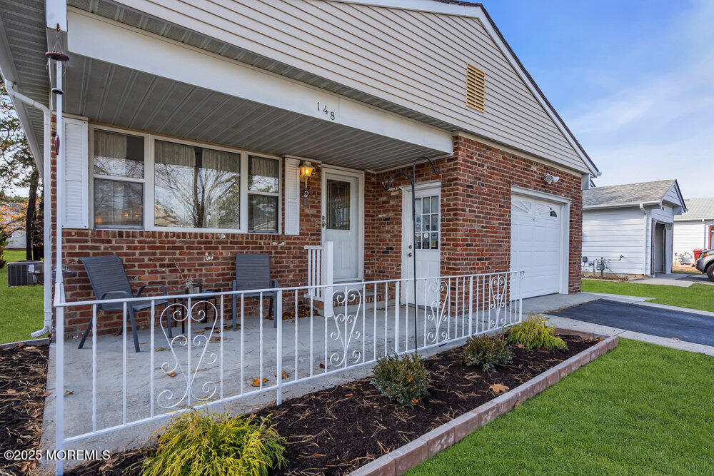148 Davenport Road Toms River, NJ 08757 - Photo 46 of 49 a house view with a garden space