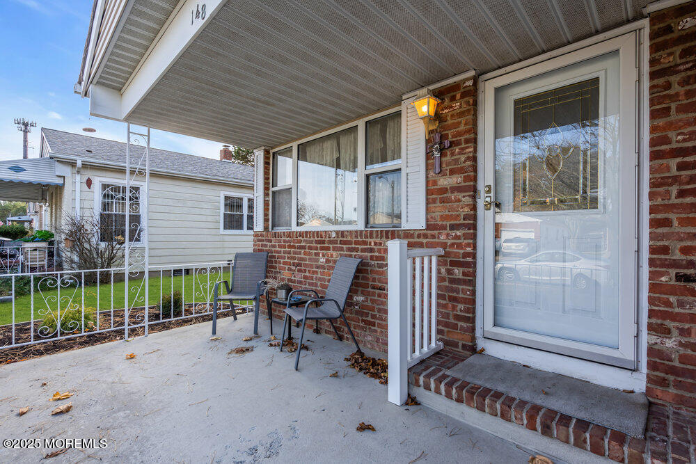 148 Davenport Road Toms River, NJ 08757 - Photo 5 of 49 a backyard of a house with barbeque oven table and chairs