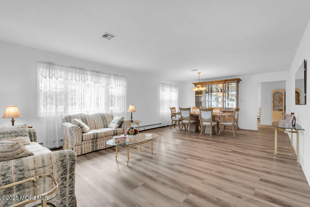 148 Davenport Road Toms River, NJ 08757 - Photo 6 of 49 a living room with furniture and wooden floor