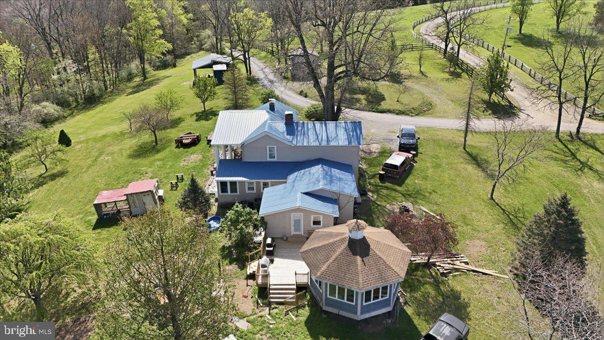 1264 Tearcoat Road Augusta, WV 26704 - Photo 30 of 43 an aerial view of a house with swimming pool and large trees