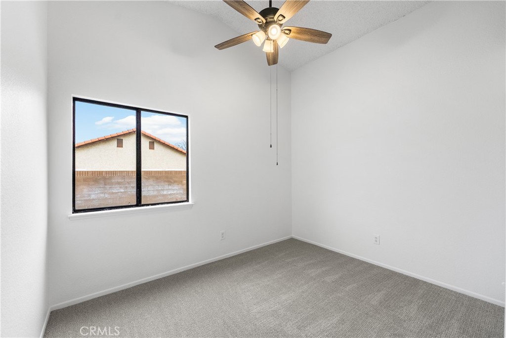 3563 East Ave R-11 Palmdale, CA 93550 - Photo 28 of 36 an empty room with a window