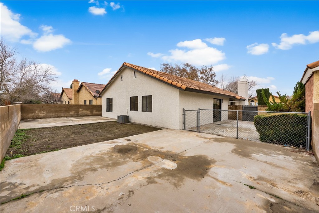 3563 East Ave R-11 Palmdale, CA 93550 - Photo 34 of 36 a view of a house with a patio