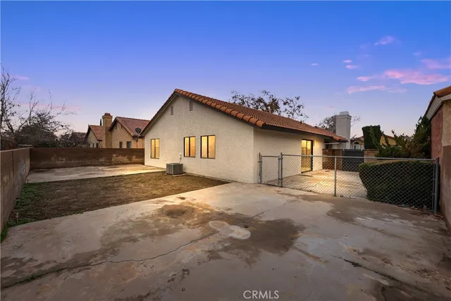 a view of backyard of a house