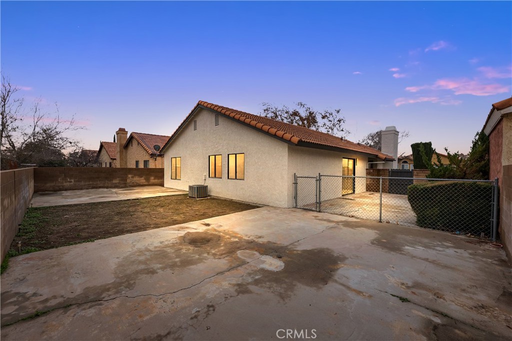 3563 East Ave R-11 Palmdale, CA 93550 - Photo 35 of 36 a view of a house with a patio