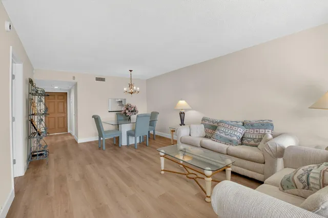 a bathroom with a sink toilet and mirror