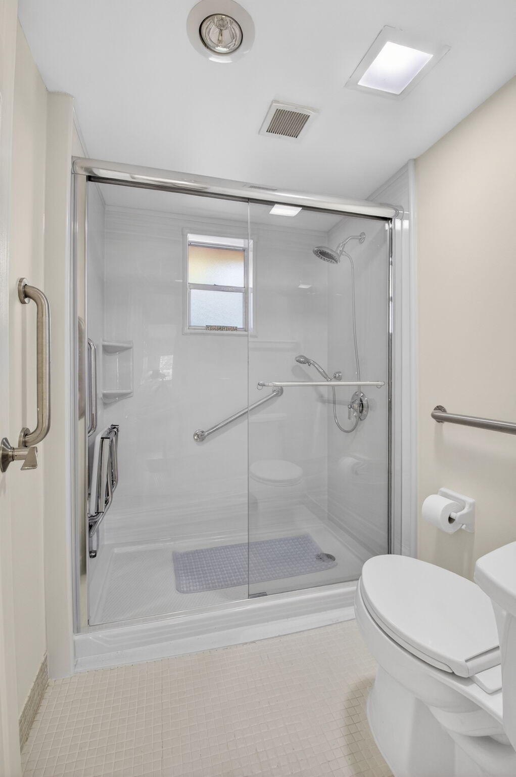 2871 North Ocean Boulevard, Unit V143 Boca Raton, FL 33431 - Photo 23 of 34 a bathroom with a shower a toilet and a shower
