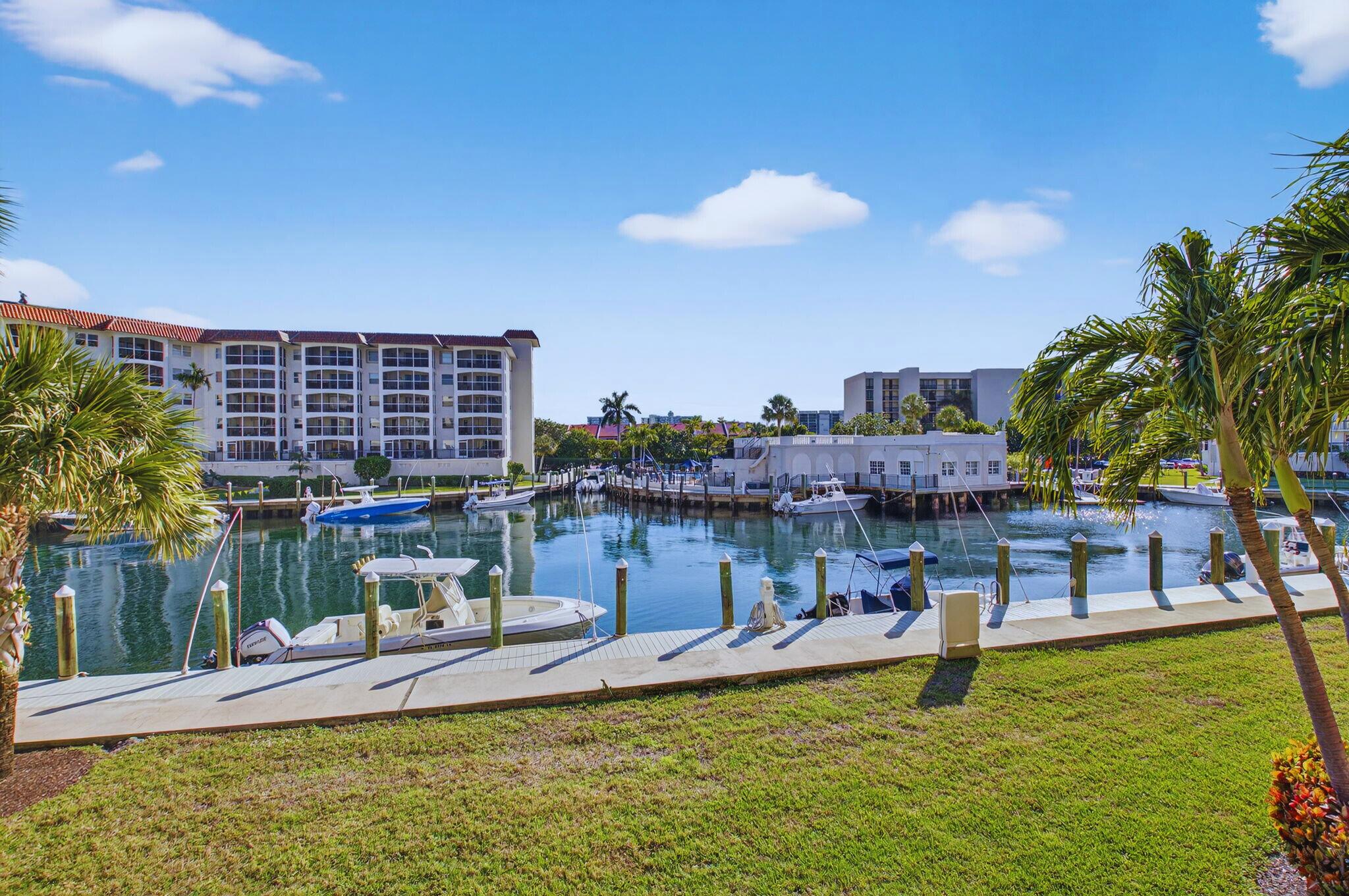 2871 North Ocean Boulevard, Unit V143 Boca Raton, FL 33431 - Photo 29 of 34 a view of a swimming pool with a patio