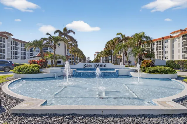 a view of a swimming pool and an outdoor space