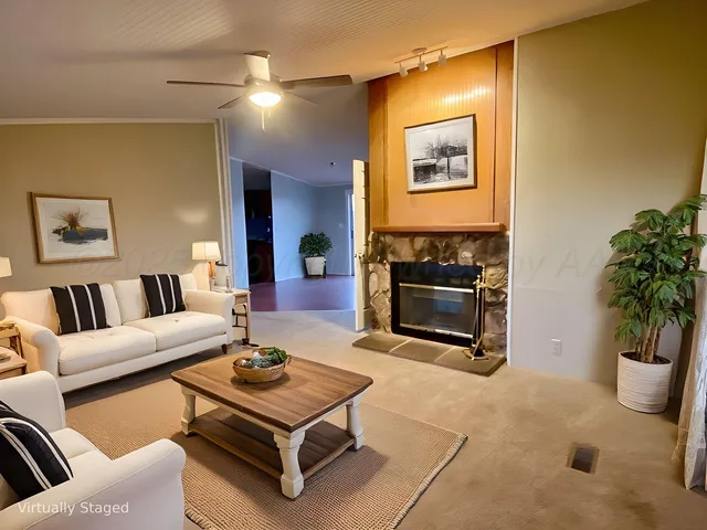 a kitchen with a sink and a refrigerator
