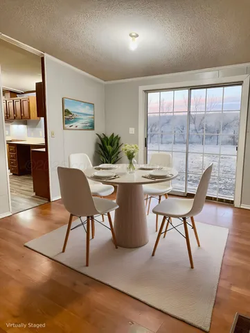 a kitchen with stainless steel appliances granite countertop wooden cabinets a sink and dishwasher