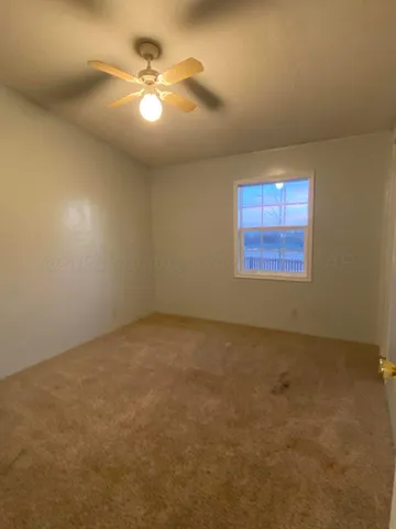 an empty room with window