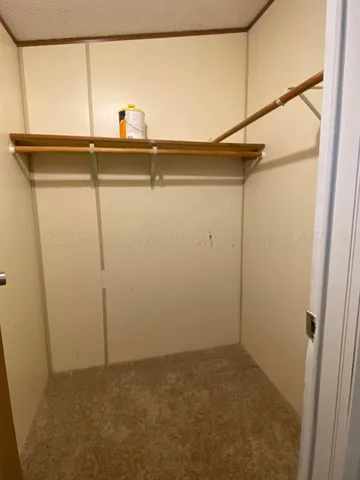 en empty room with windows