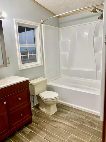 a house with trees in front of it