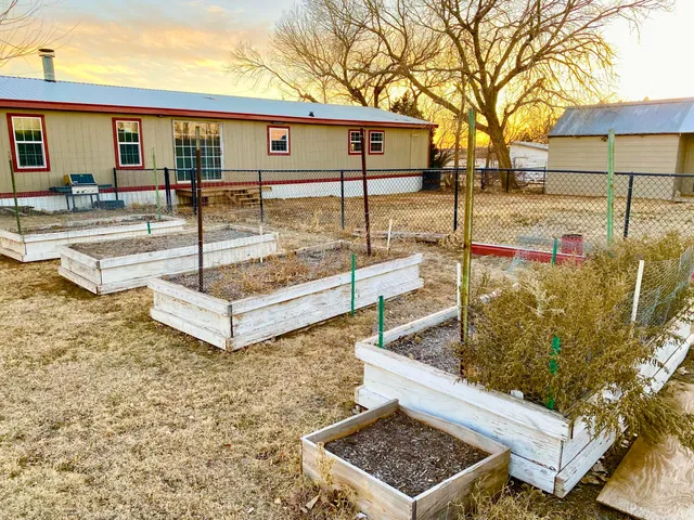 a view of an empty room with a fireplace