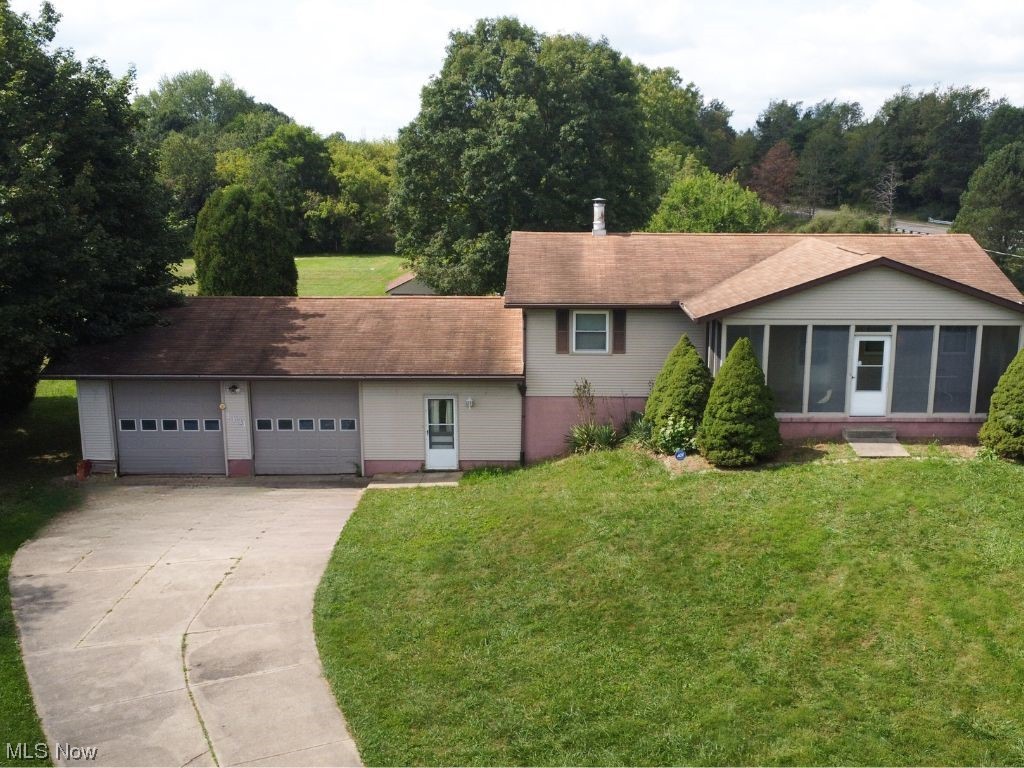 1431 May Road Mogadore, OH 44260 - Photo 1 of 22 Single story home with garage and a front lawn