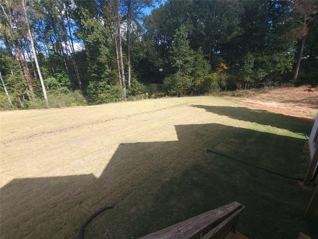 670 Old Alpharetta Road Cumming, GA 30041 - Photo 4 of 13 a view of swimming pool with a yard