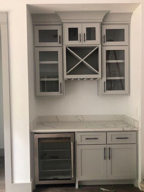 670 Old Alpharetta Road Cumming, GA 30041 - Photo 9 of 13 a kitchen with white cabinets and sink
