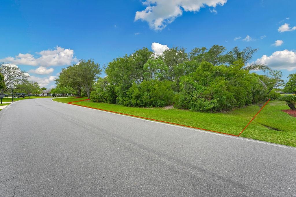 427 Marsh Point Circle St. Augustine, FL 32080 - Photo 3 of 25 a view of a field and basketball court
