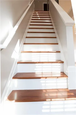 a kitchen with stainless steel appliances a sink and cabinets