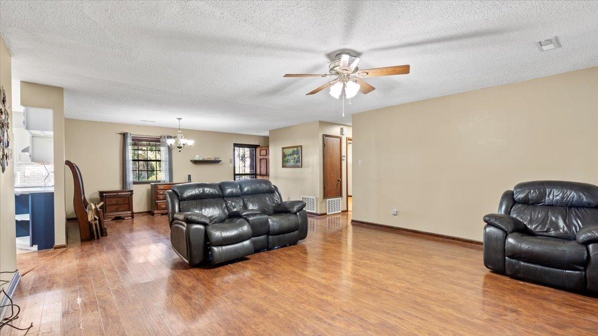 1586 Pickens Store Road Mason, TN 38049 - Photo 8 of 23 a living room with furniture and a wooden floor
