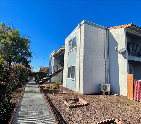 a house view with a outdoor space