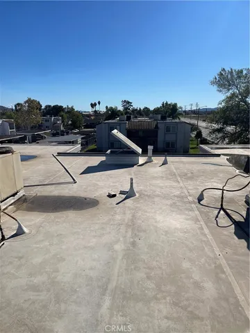 a view of a terrace with chairs