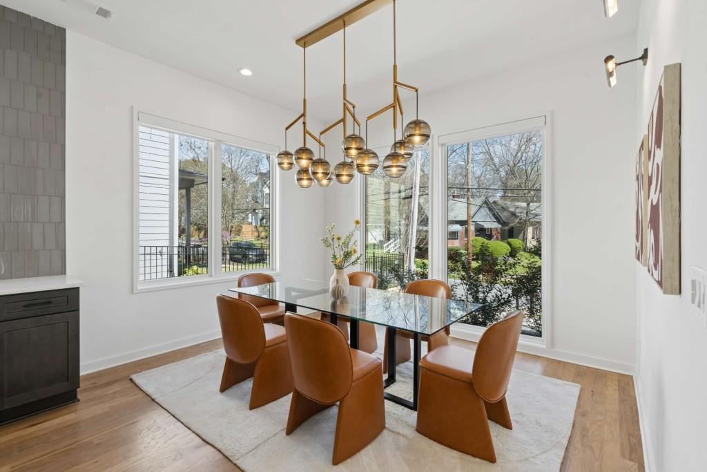 32 Walthall Street Northeast, Unit A Atlanta, GA 30307 - Photo 12 of 39 a view of a dining room with furniture and chandelier