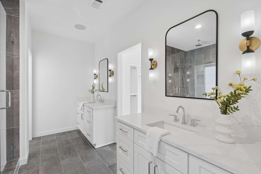32 Walthall Street Northeast, Unit A Atlanta, GA 30307 - Photo 20 of 39 a bathroom with a sink and a mirror
