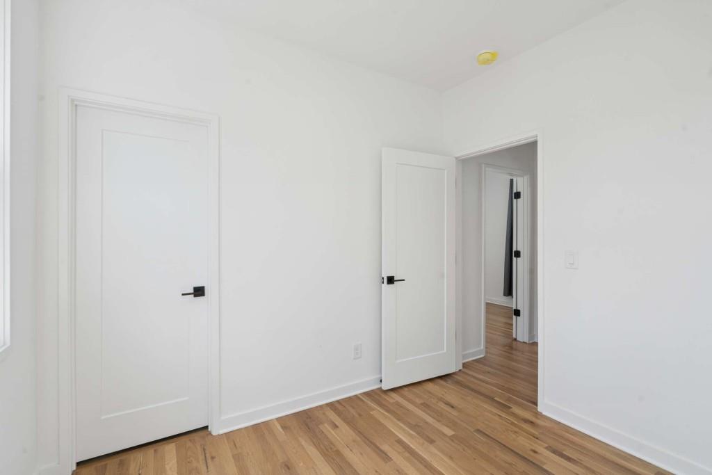 32 Walthall Street Northeast, Unit A Atlanta, GA 30307 - Photo 30 of 39 a view of hallway with wooden floor