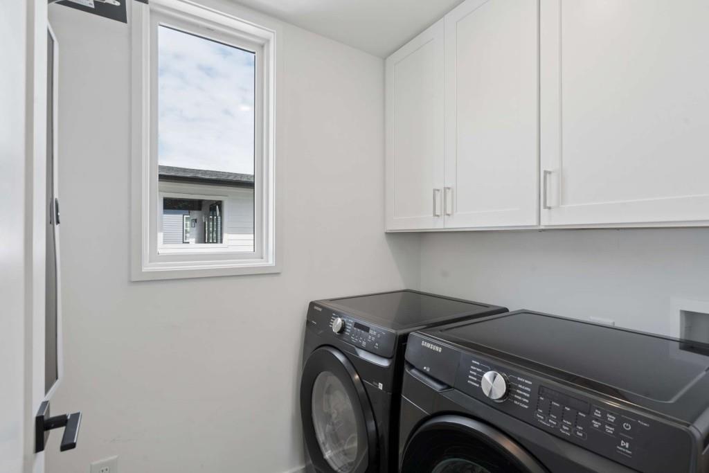 32 Walthall Street Northeast, Unit A Atlanta, GA 30307 - Photo 31 of 39 a utility room with dryer and washer