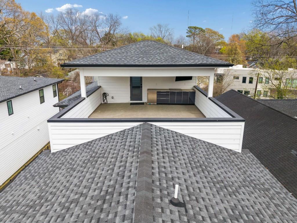 32 Walthall Street Northeast, Unit A Atlanta, GA 30307 - Photo 7 of 39 a aerial view of a house with a yard
