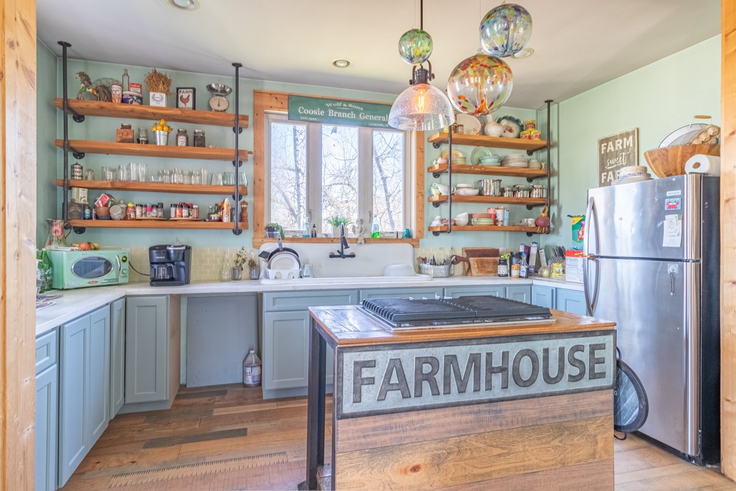 1277 Coosie Branch Road Cornersville, TN 37047 - Photo 13 of 47 a kitchen with refrigerator and window