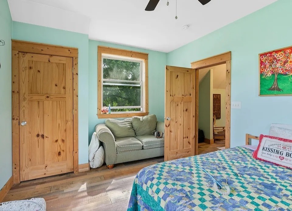 1277 Coosie Branch Road Cornersville, TN 37047 - Photo 19 of 47 a bedroom with a bed and a couch