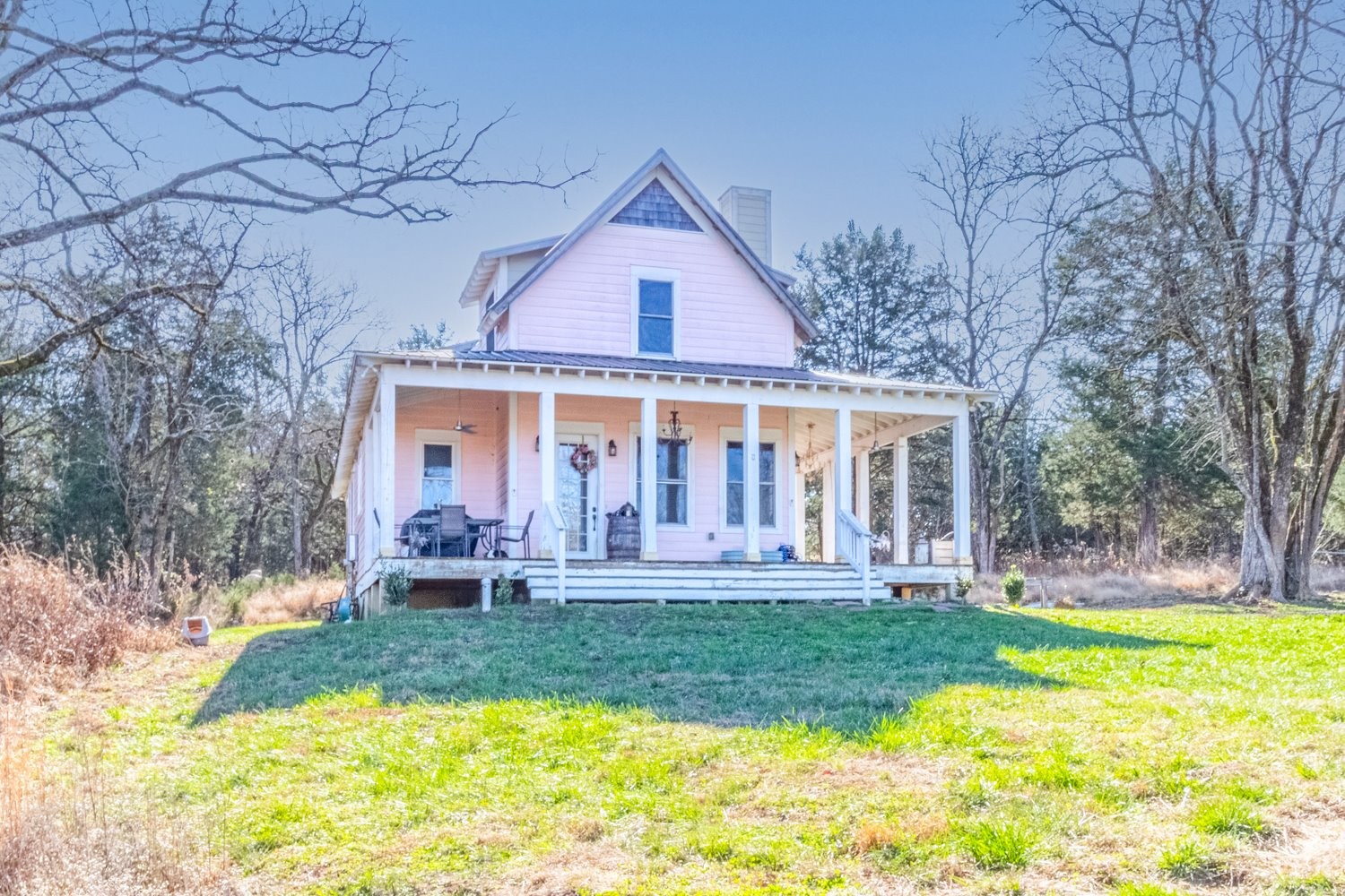 1277 Coosie Branch Road Cornersville, TN 37047 - Photo 24 of 47 a front view of a house with swimming pool and garden