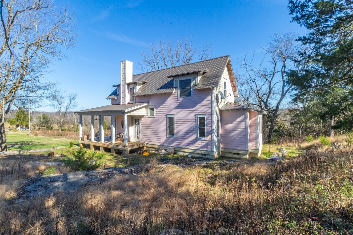 1277 Coosie Branch Road Cornersville, TN 37047 - Photo 25 of 47 a view of a house with a yard