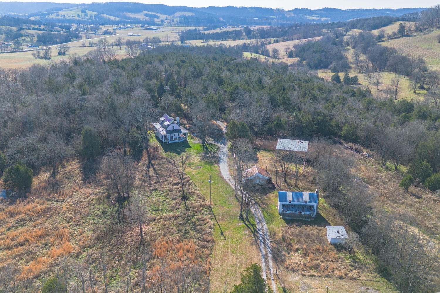 1277 Coosie Branch Road Cornersville, TN 37047 - Photo 31 of 47 an aerial view of a house with a yard
