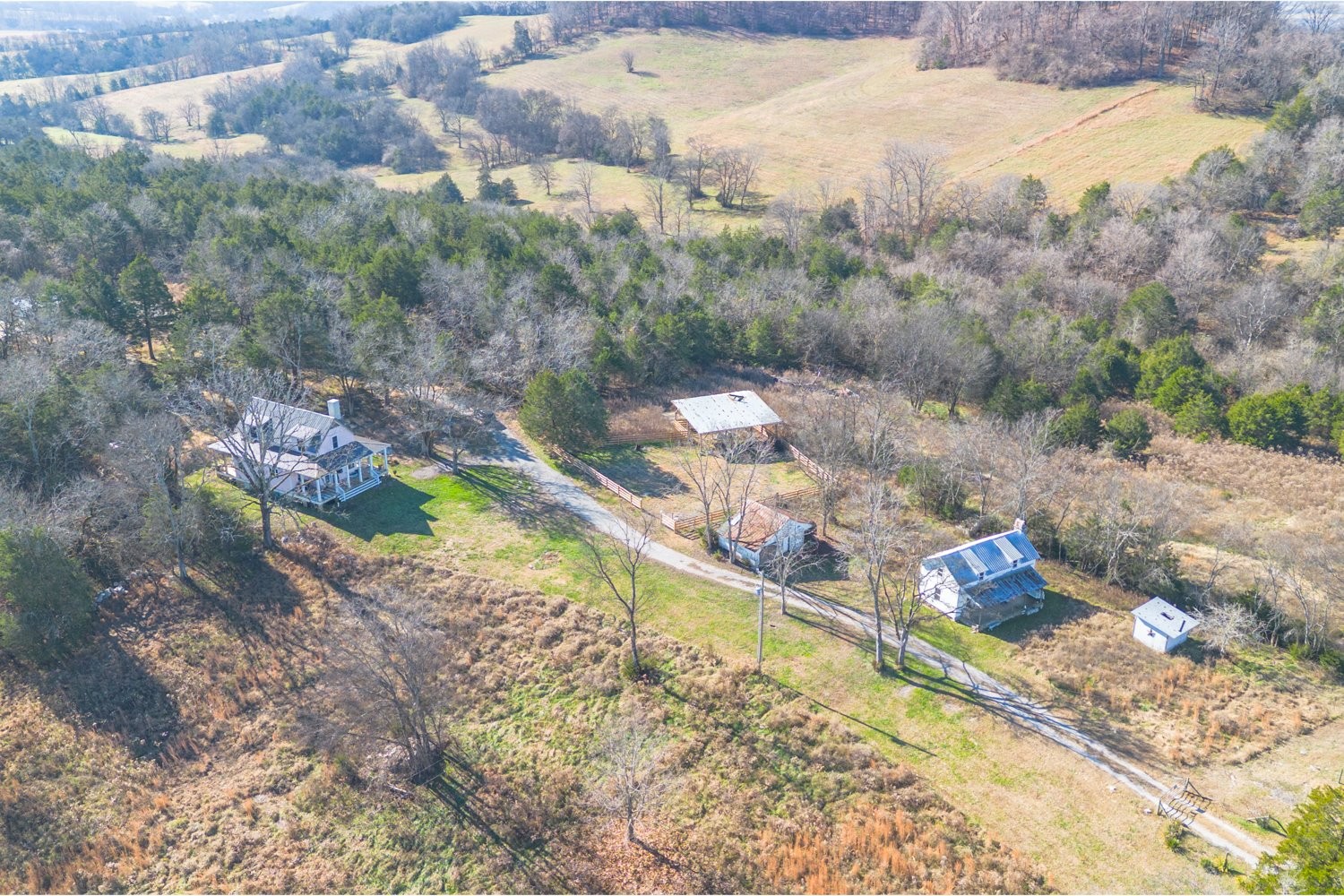 1277 Coosie Branch Road Cornersville, TN 37047 - Photo 4 of 47 a view of a backyard with wooden fence