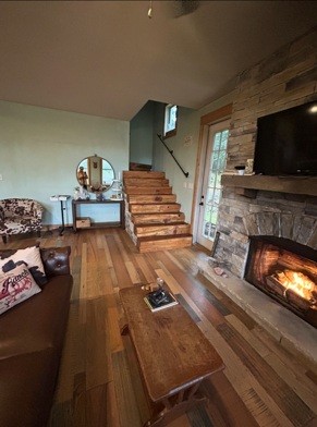 1277 Coosie Branch Road Cornersville, TN 37047 - Photo 44 of 47 a living room with furniture and a flat screen tv