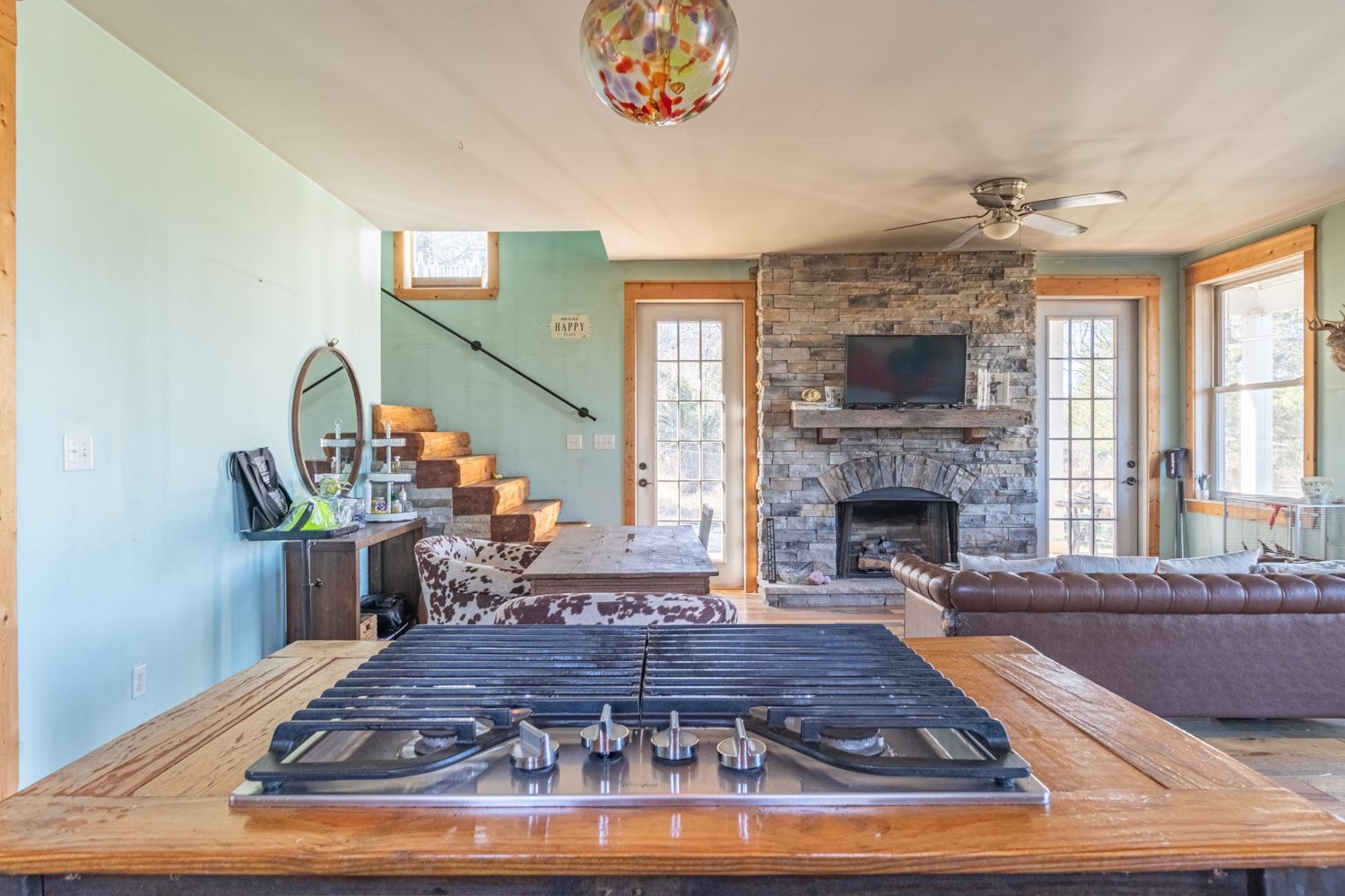 1277 Coosie Branch Road Cornersville, TN 37047 - Photo 10 of 47 a living room with furniture and a fireplace