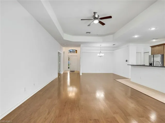 a view of a livingroom with a ceiling fan